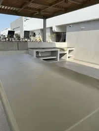Zona de parrilla con lavadero